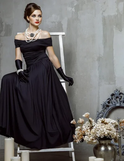 Elegant black off-the-shoulder gown, showcasing luxury apparel manufacturing.