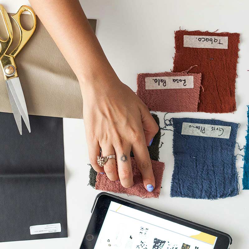 Biodegradable fabrics and natural fiber garments being produced at Ibex Fashion’s eco-friendly clothing facility in the USA with international shipping.