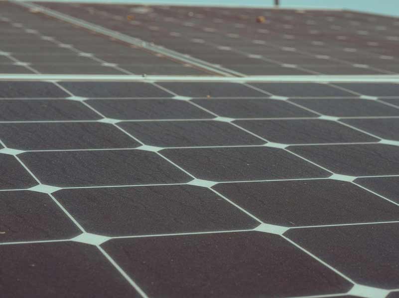 Solar panels powering sustainable clothing manufacturing at Ibex Fashion for USA-based production with global shipping